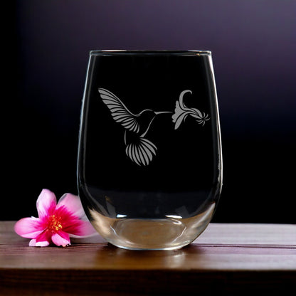 Hummingbird sipping form a Hibiscus Stemless Wine Glass - Copyright Hues in Glass