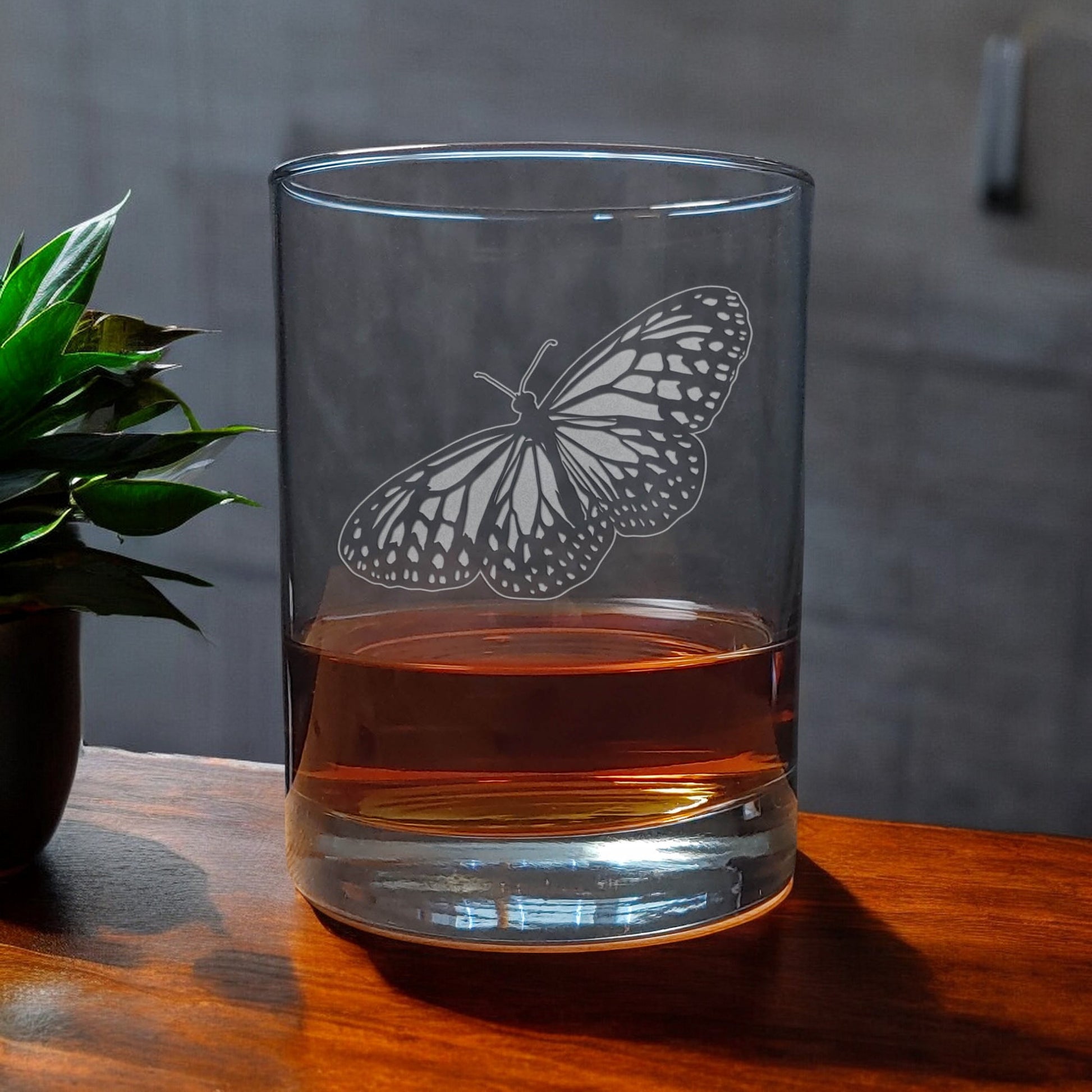 Image of a Butterfly flying to the left on 13oz whiskey glass
